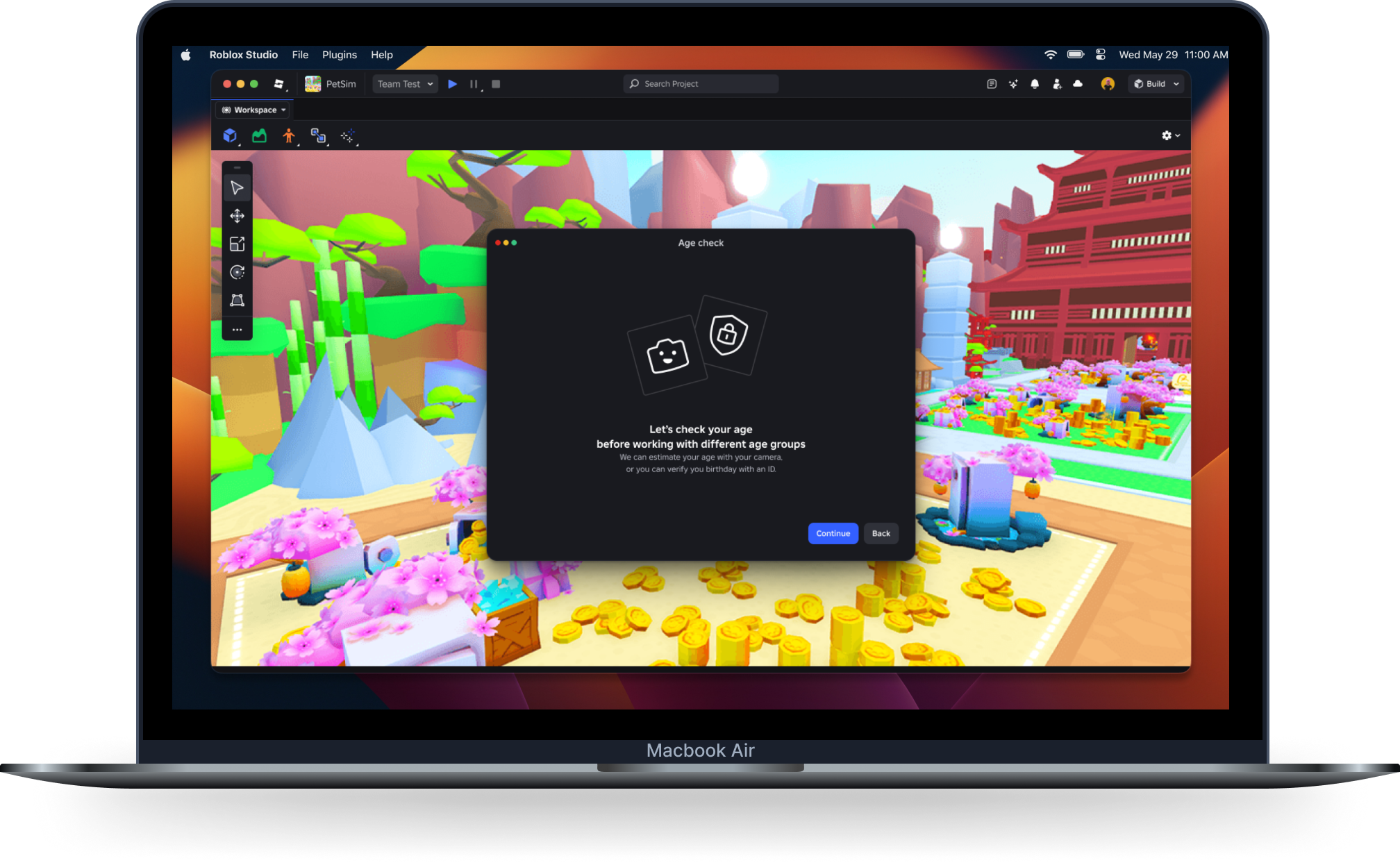 Roblox Studio age check modal shown on a MacBook Air